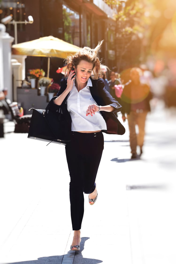 Business woman rushing to work